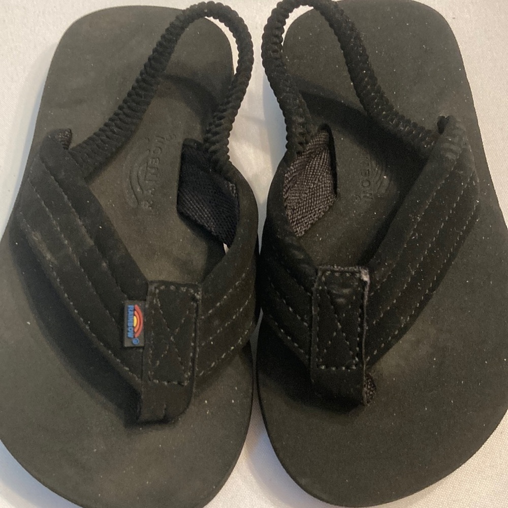 Rainbow Black Sandals Comfortable Flip Flops .  Believe never worn!